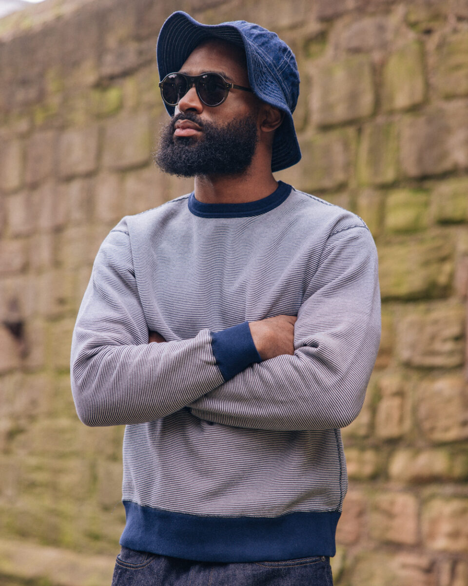 Papa Nui Coral Cruiser Sunglasses worn with the Loop & Weft Pin Border Knit Sweatshirt and Papa Nui Army Denim Hat
