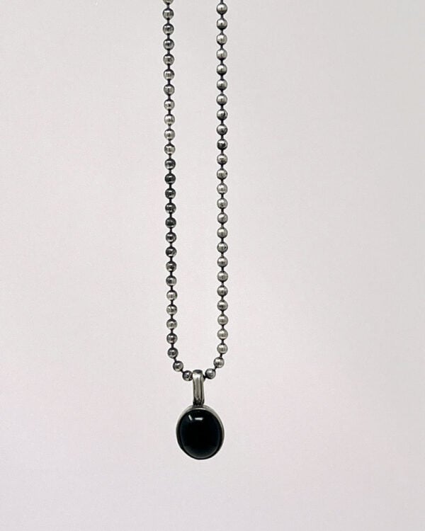 Red Rabbit Trading Co. Onyx Oval Charm